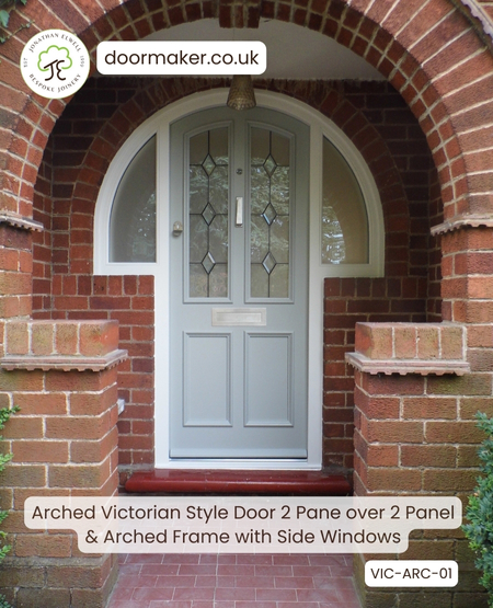 arched victorian front door with decorative glass