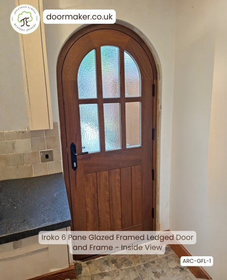 arched cottage door with 6 panes made from iroko