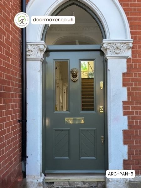 gothic arch toplight above victorian door with diagonal t&g boards
