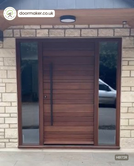 contemporary style door made from Iroko with glazed side lights