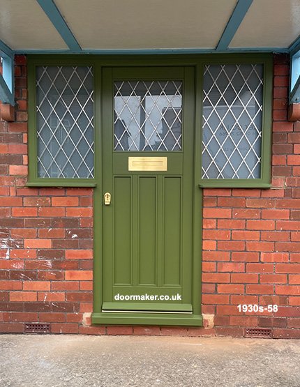 1930s style front door with side windows green