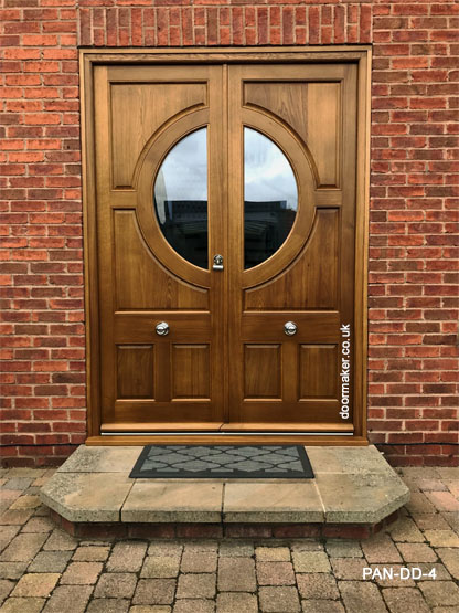 panel double doors with circular glass and frame