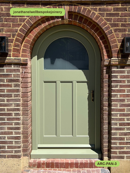 arched panel door lichen