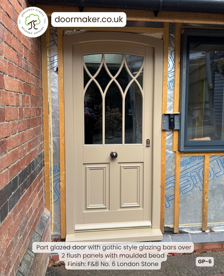 bespoke hardwood door with gothic glazing bars - finished in F&B shade London Stone