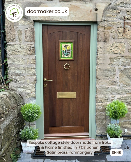 cottage style door made from iroko with lichen frame