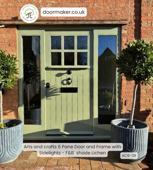 arts and crafts door with sidelights finished in farrow and ball lichen