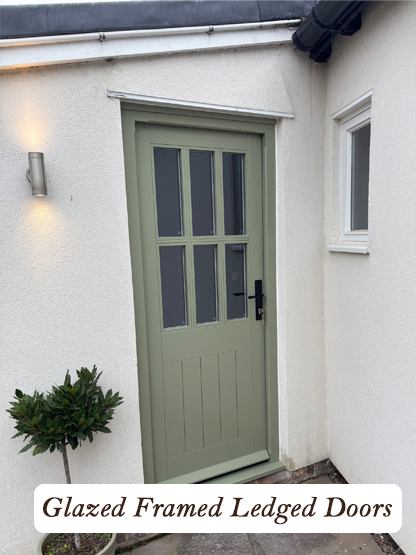 cottage style multi pane glazed framed ledged doors