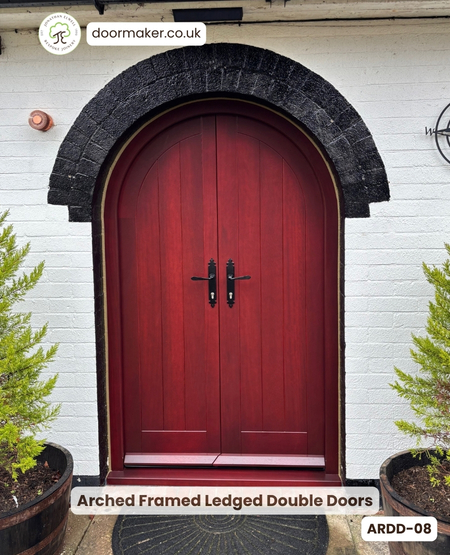 arched double doors framed ledged made from Iroko finished Mahogany