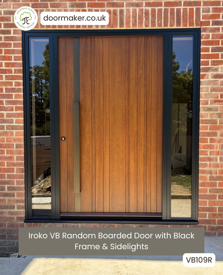 iroko contemporary door with random with boards and black frame with sidelights