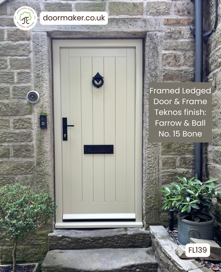 cottage style front door finished in Farrow and Ball shade No. 15 Bone