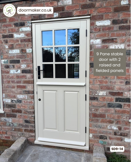 stable door with 9 panes over 2 raised and fielded panels